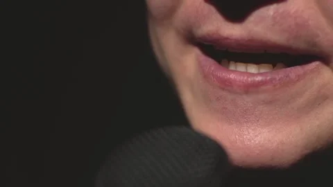 A man laughs into the microphone Stock Footage 212541812