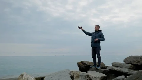 Man launching the drone from the hand Video stock 104869270