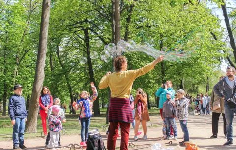 Man launching soap bubbles. Photos