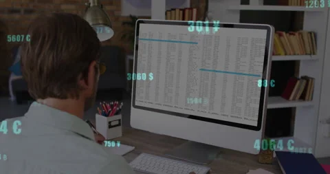 Man launching spreadsheet and tracking floating currency overlays reviewing live Stock Footage 311901573