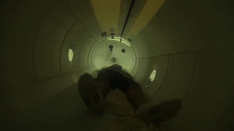 Man in laying on the back in the altitude camera, m/s Stock Footage