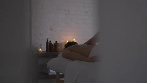 Man Laying Down Getting Massage In Spa Stock Footage 208727480