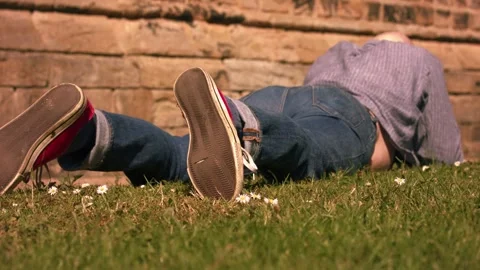 Man laying in grass Stock-Footage 336956040