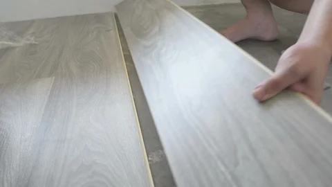 Man laying PVC-floor Stock Footage 90828520