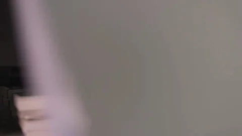 Man lays down in the gun safe and money Stock Footage 69221703