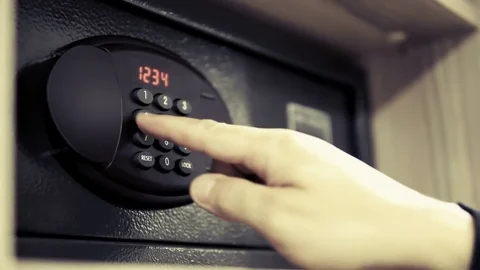 Man Lays Down in a Safe Valuables on Code Lock Stock Footage 76374245