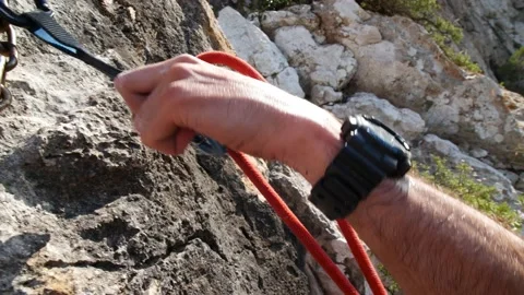 Man lead climbing in wall next to sea 4K 20 Stock Footage 139982592