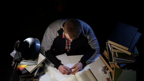 Man leafing through the book and could not find what he is looking for Stock Footage