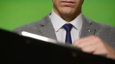 Man leafing through pages Stock Footage 113471448
