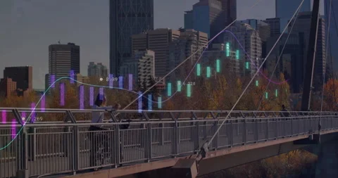 Man leaning on bridge railing with bicycle, viewing finance charts and Stock Footage 308603718