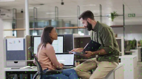 Man leaning forward opening folder and pointing documents for review, woman Video stock 332577549