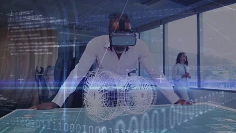Man leaning hands bracing desk VR-headset using rotating model as code streaming Stock Footage 334034873