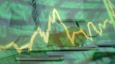 Man leaning on table writing clipboard, green data overlay sweeping frame Stock Footage 334768329