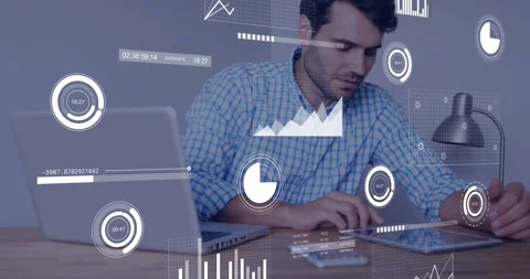 Man leaning toward tablet, switching typing and tapping while HUD charts Stock Footage 328396219