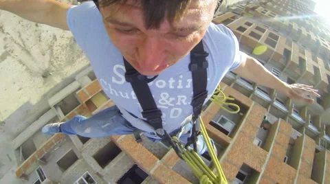 Man leaps forward, his arms and legs Stock Footage 48363867