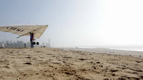 Man Learns to Hang Glide Stock Footage 46948443