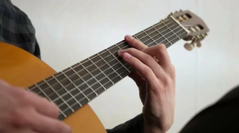 Man learns to play guitar 스톡 동영상 60593157