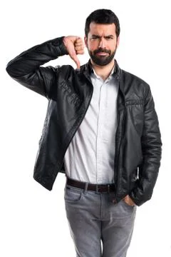 Man with leather jacket doing bad signal Stock Photos