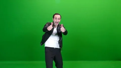 Man in Leather Jacket Giving Thumbs Up Green Screen 库存影片 83734733