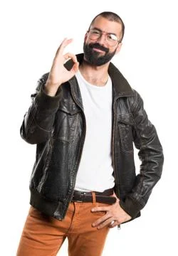 Man with leather jacket making OK sign Stock Photos