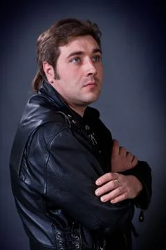Man in a leather jacket Stock Photos