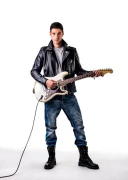 Man in Leather Jacket Playing Electric Guitar Stock Photos