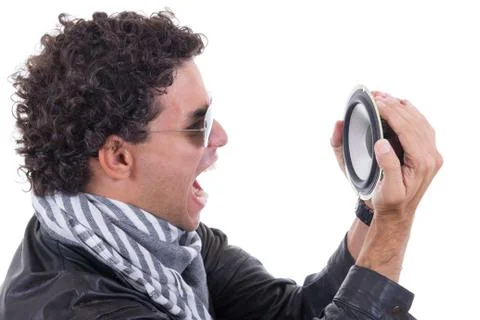 Man in a leather jacket yelling to speaker Stock Photos