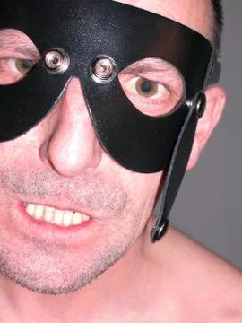 Man with leather mask Stock Photos