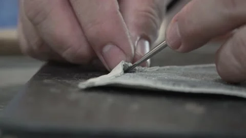 Man Leatherworking with Needle and Hammer, 4K 스톡 동영상 138182746