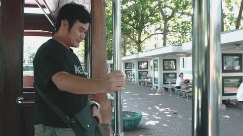 A man leaving a shuttle bus Stock Footage 98599864