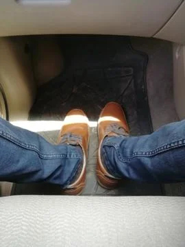 Man leg with brown boot Foto stock