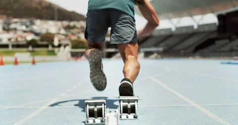 Man, legs and runner with start for race, speed or sprint in athletic takeoff on Stock Photos