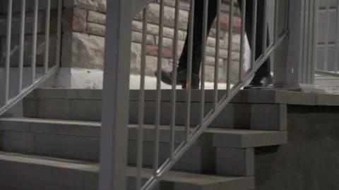 Man Legs Going Down The Stairs Stock Footage 246254977