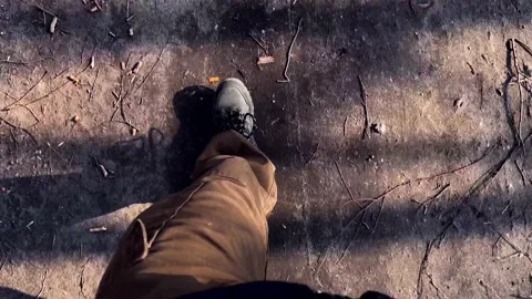 Man legs walking on sandy road. POV 4k video Stock Footage 171994209