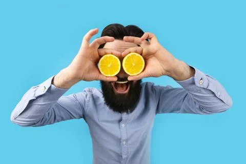 Man with lemon Stock Photos