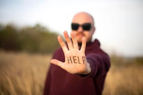 Man lend a helping hand Stock Photos