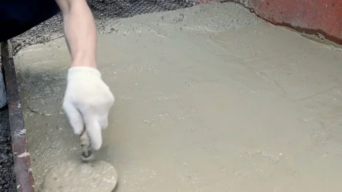 Man is leveling cement 스톡 동영상 80293037