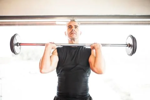 Man lifting bar Foto stock