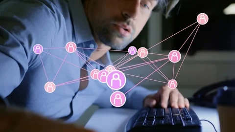 Man lifting head, blinking, leaning to keys, typing as pink node overlay shifts, Stock Footage 334182908