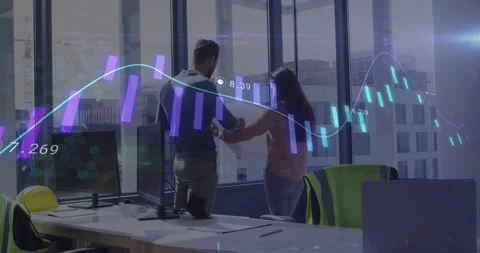 Man lifting orange sphere to window, colleagues analyzing tech data with Stock Footage 319851631