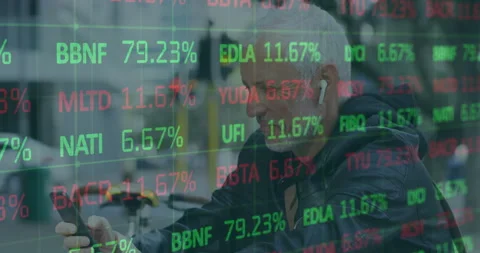 Man lifting smartphone and unlocking phone while monitoring financial market Stock Footage 310319445
