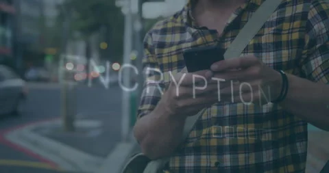 Man lifting smartphone entering encrypted message for secure chat on street Video stock 312083252