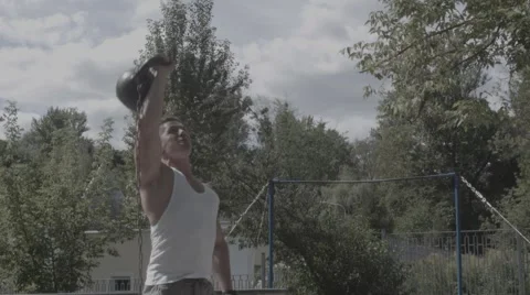 Man is lifting weight. (BMCC 2.5K - 2400x1350) Stock Footage 47958096