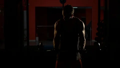 The man is lifting a weight Видео 70966572