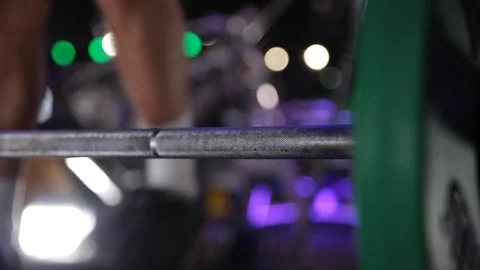 Man lifting weight in the gym Stock Footage 104925865