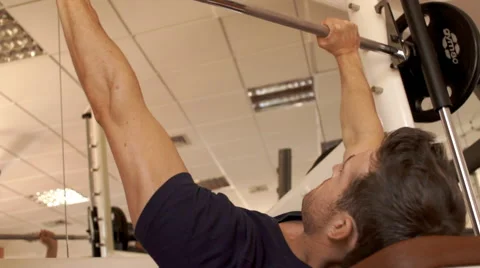 Man lifting weights at gym. Stock Footage 43666734