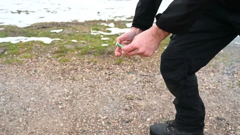 Man lighting up and throws firecrackers. Pyrotechnics. Firecracker explosion Stock Footage 231302204