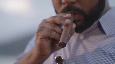 Man Lighting a Cigar 스톡 동영상 102724399