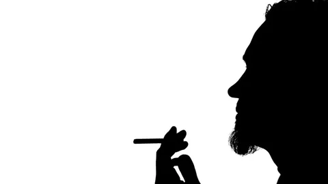 Man lighting a cigarette Video stock 77630447