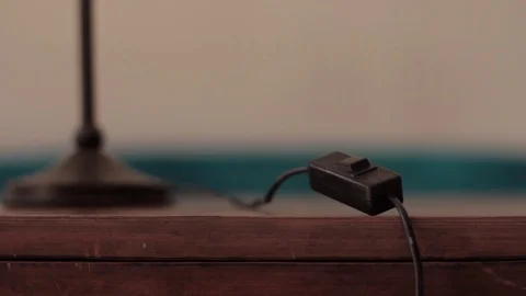 Man lighting a lamp Stock Footage 81684630